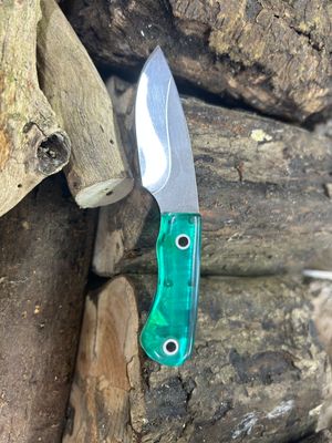Knife with green handle