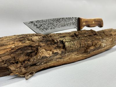 Knife on a piece of wood