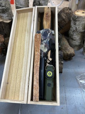 Wooden box with camping tools