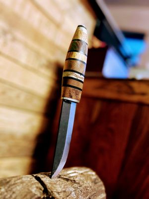 Knife on wooden surface